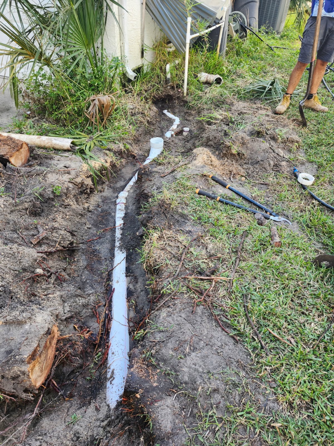 Trench opened to reach the failing line and map the run.